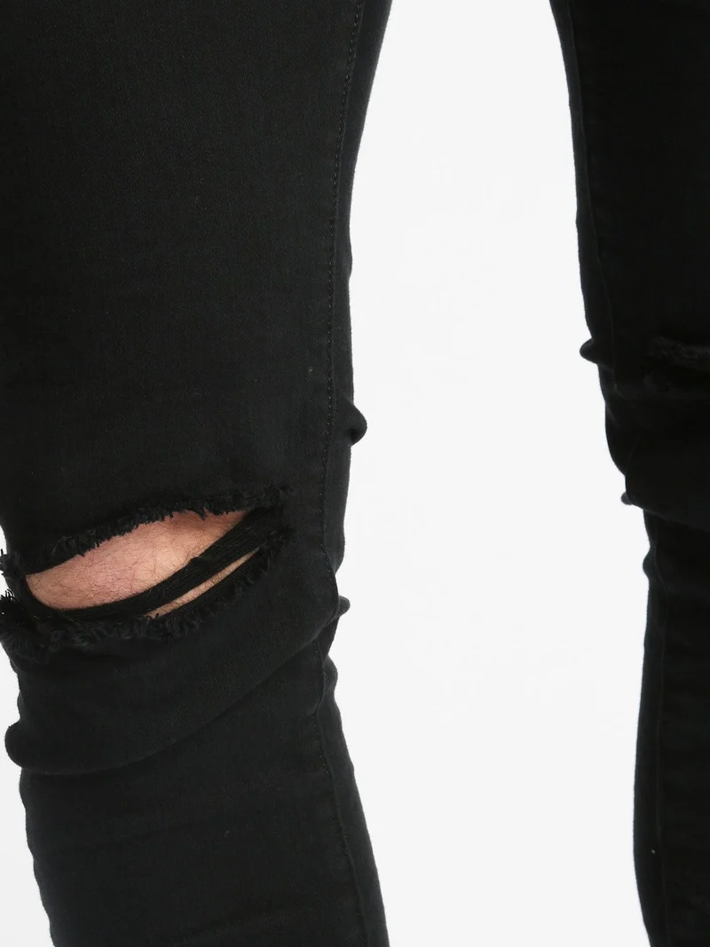 Pantaloni strappati - nero