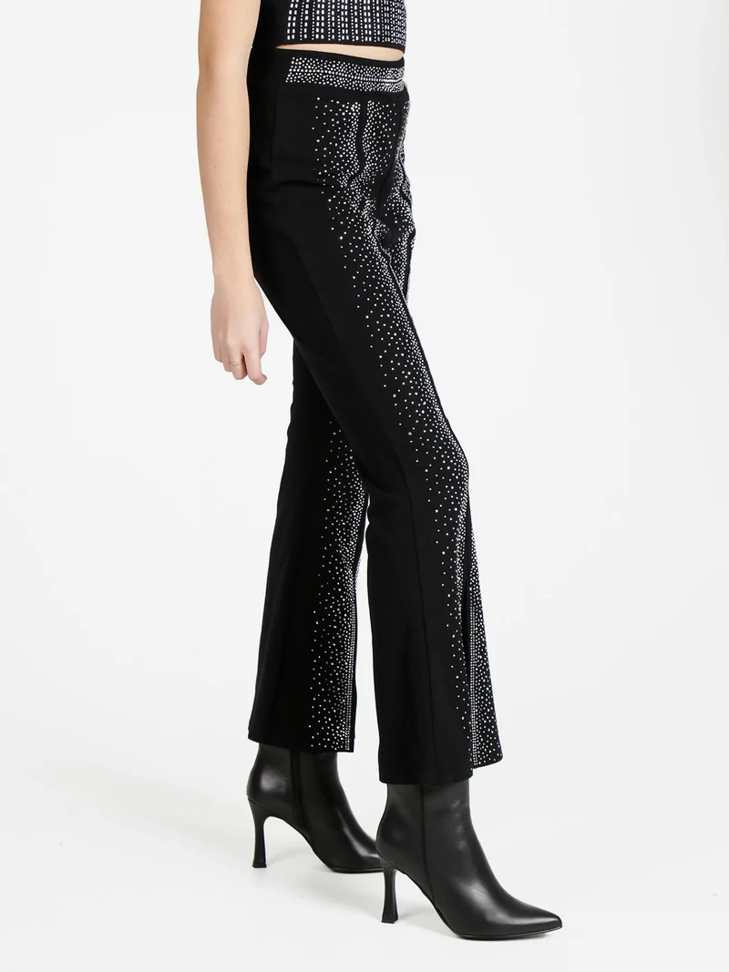 Pantaloni eleganti da donna con strass e finale a zampa con spacco - argento