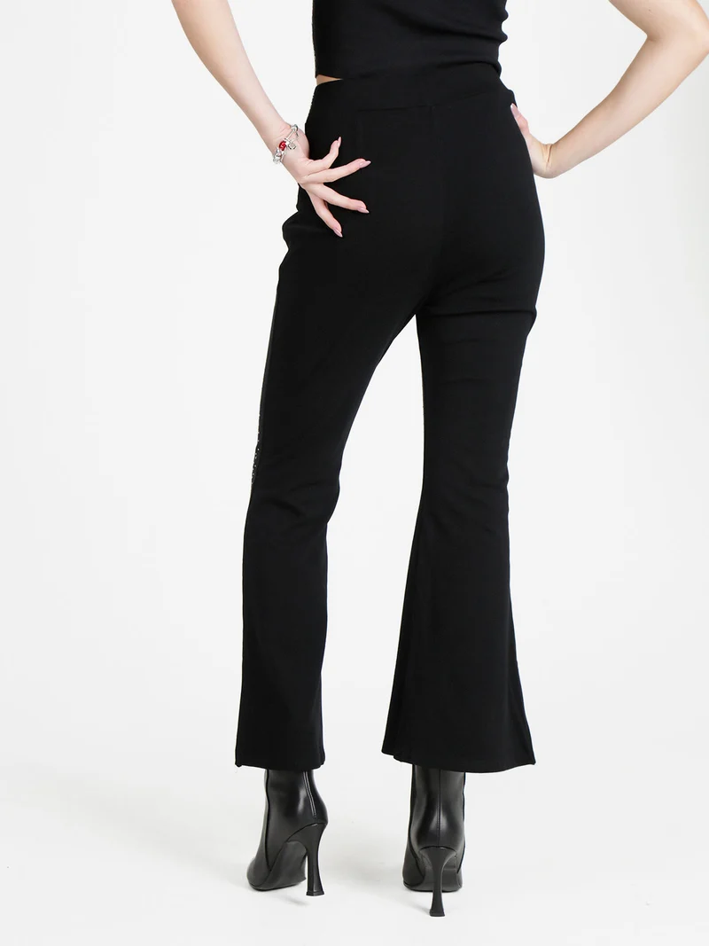 Pantaloni eleganti da donna con strass e finale a zampa con spacco - argento