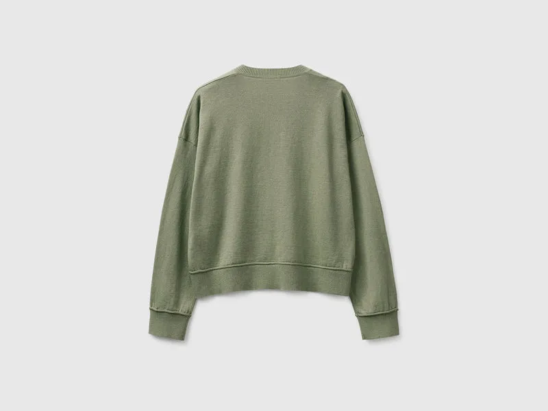 Pullover mit V-Ausschnitt aus Baumwolle und Wolle