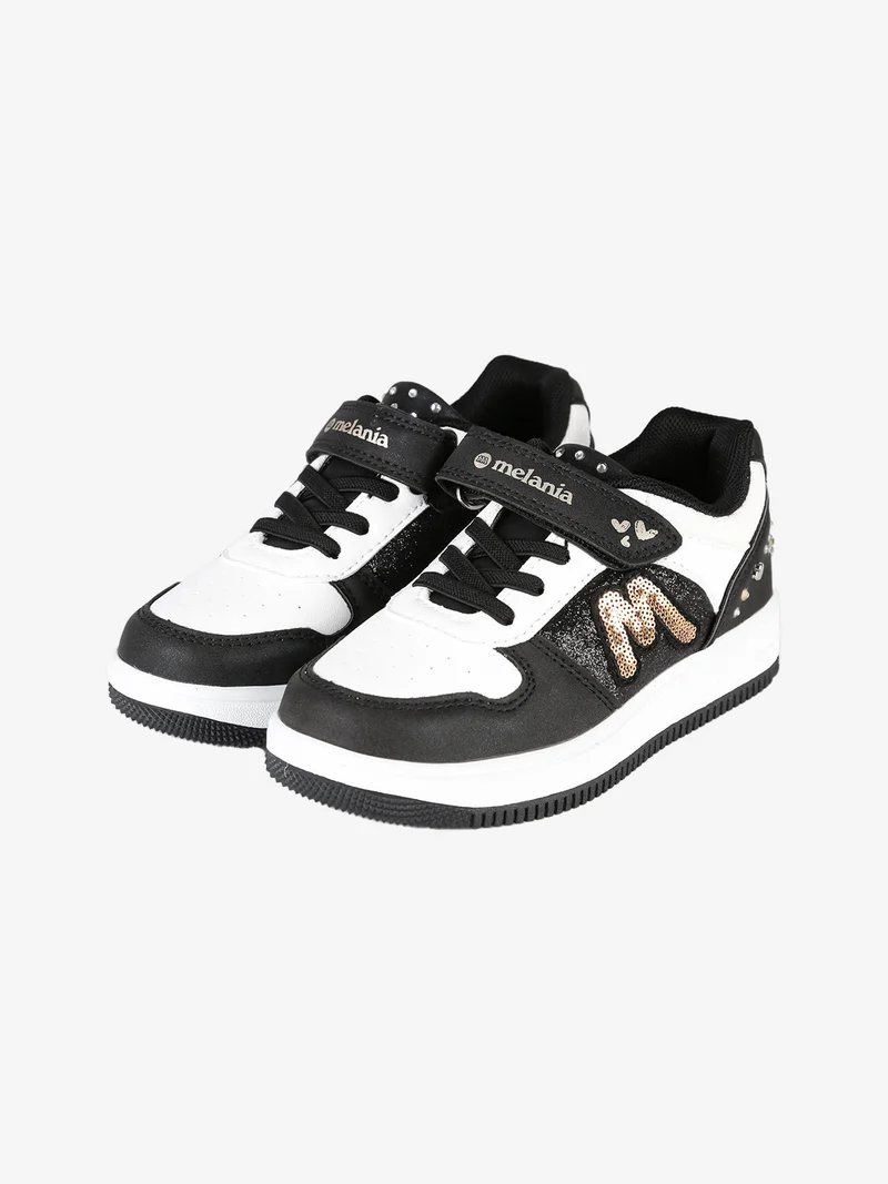 Sneakers bicolore da bambina con strass e cinturino a strappo - nero