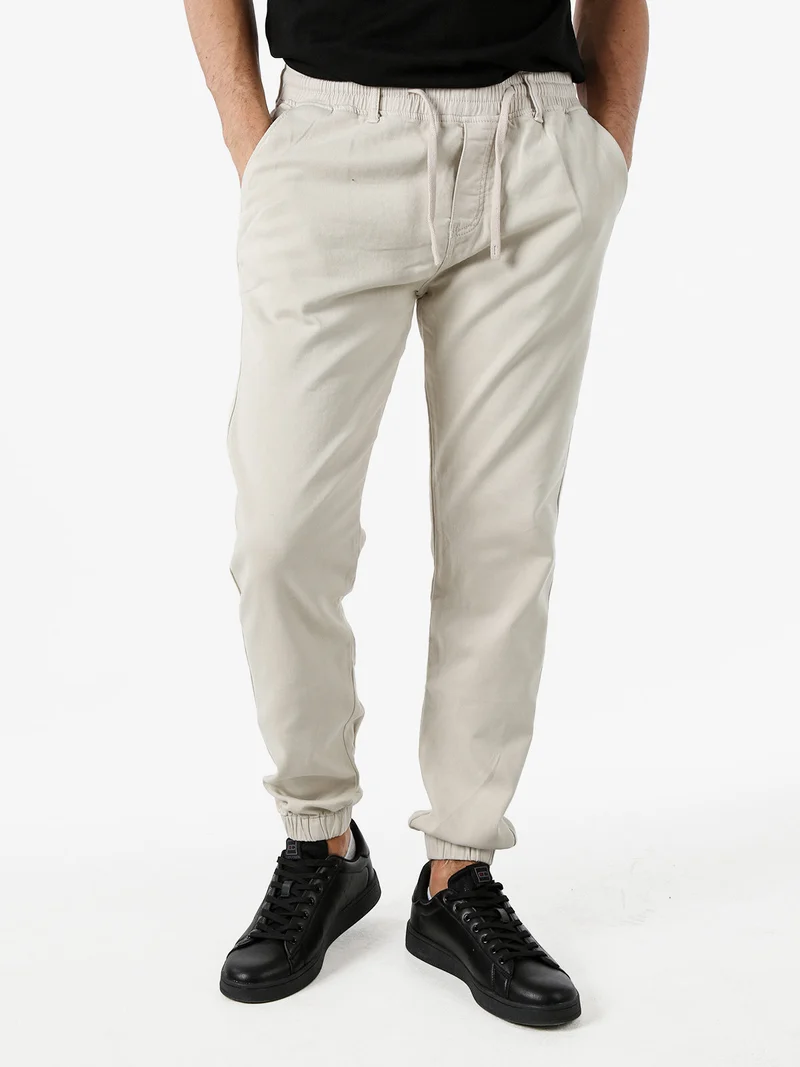 Pantaloni da uomo in cotone con coulisse ed elastico sul finale - beige