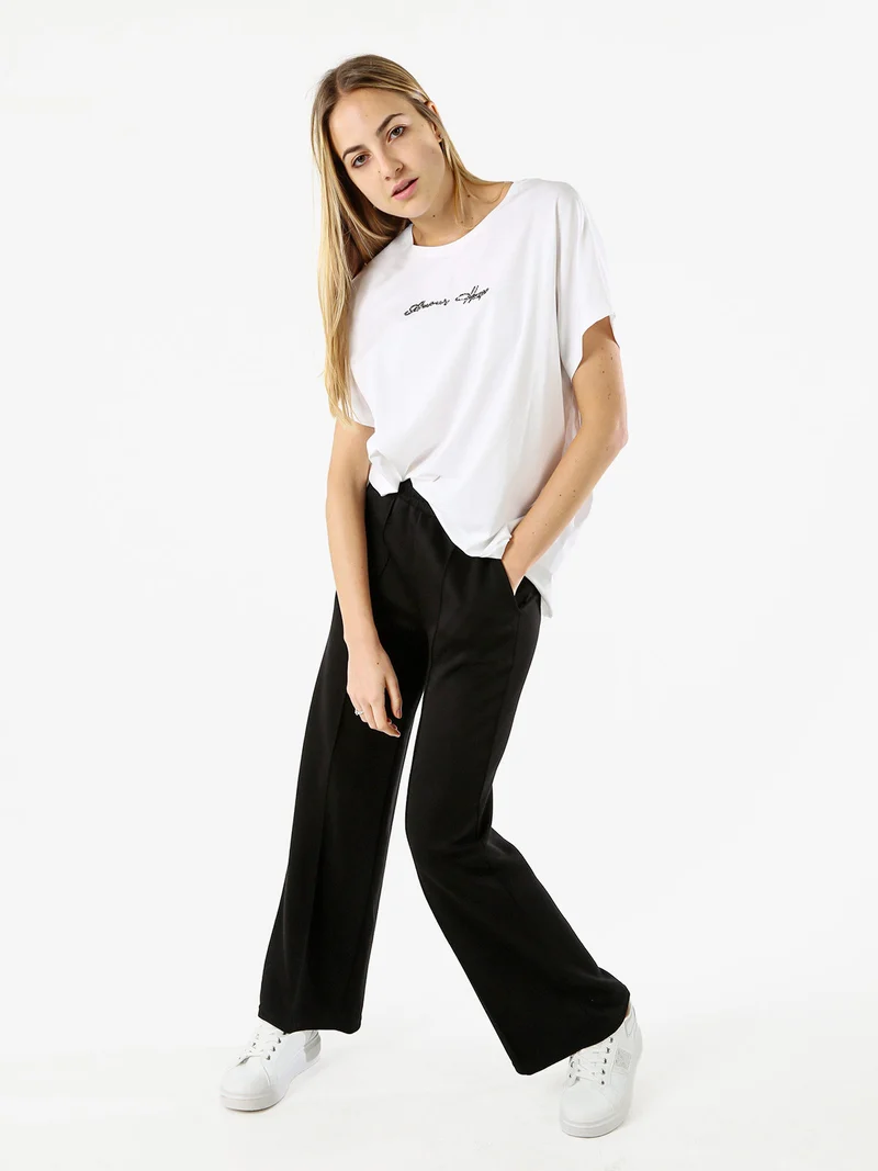 T-shirt donna oversize in cotone con scritta a lustrini - bianco