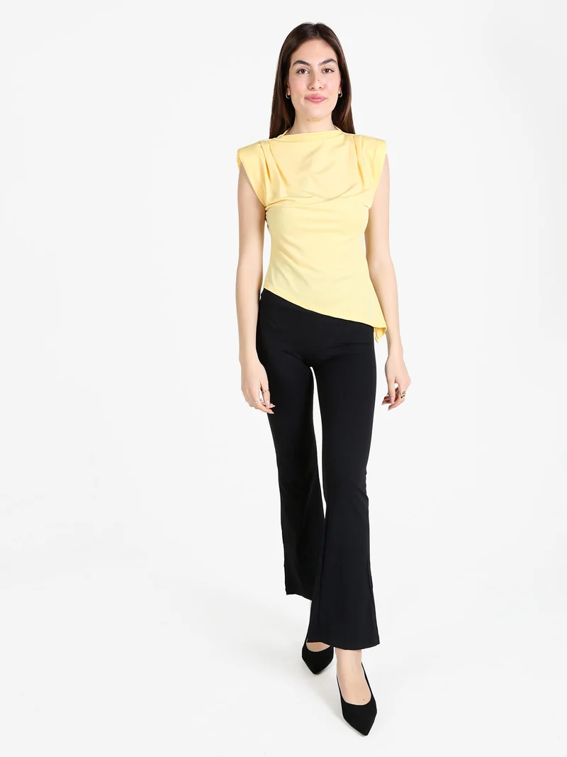 Top donna con spalle imbottite e finale a punta - giallo