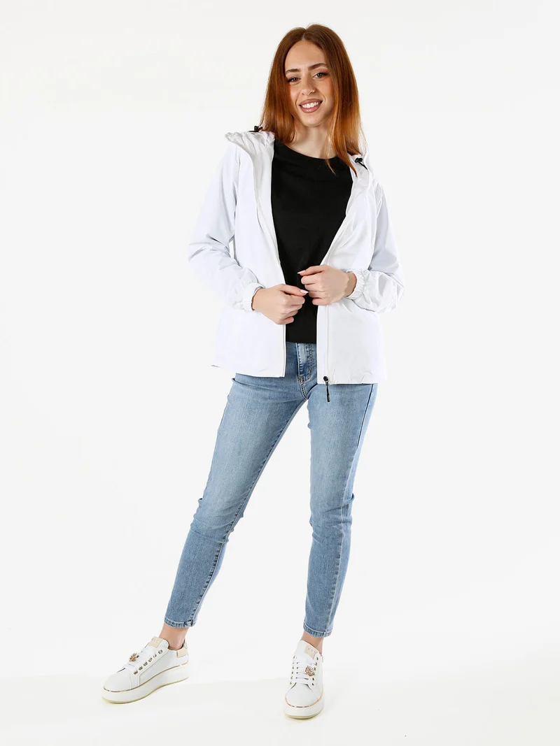 Giacca a vento da donna con cappuccio - bianco