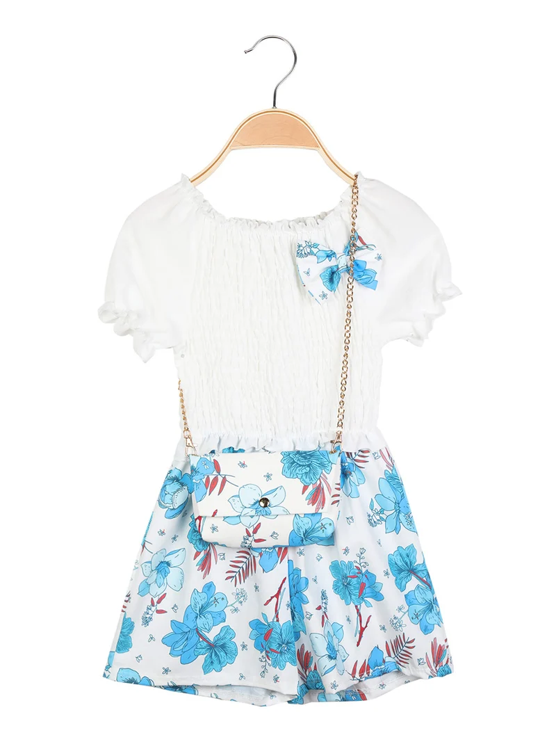 Tutina jumpsuit da bambina a fiori con borsetta - blu