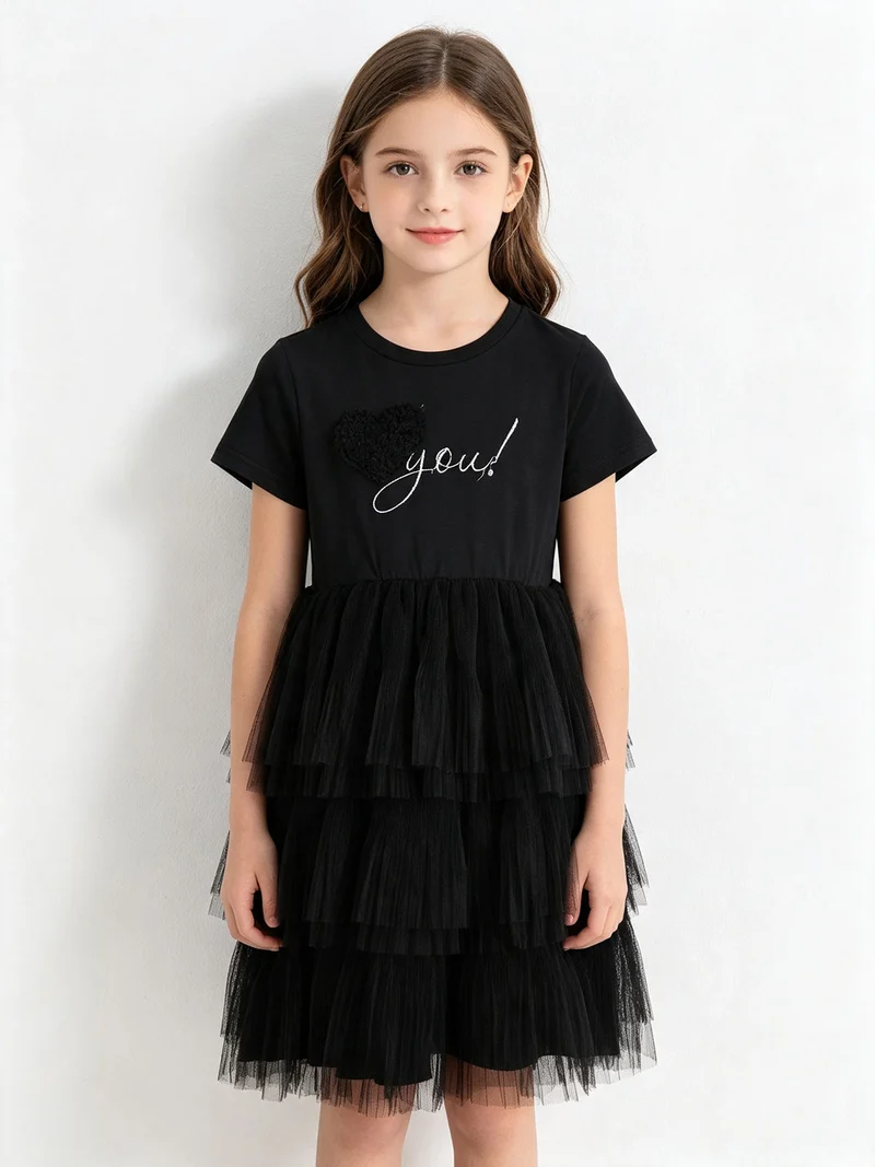 Abito da bambina a maniche corte con gonna a balze in tulle - nero