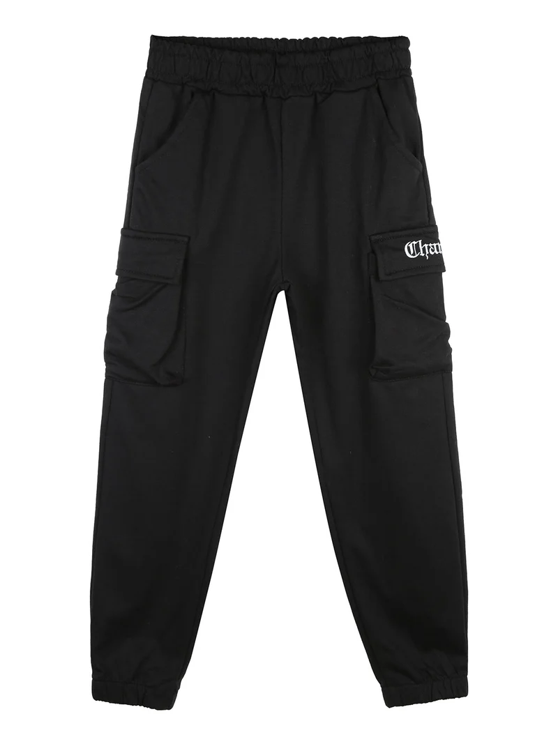 Pantaloni tuta da ragazzo con tasconi laterali e polsini - nero