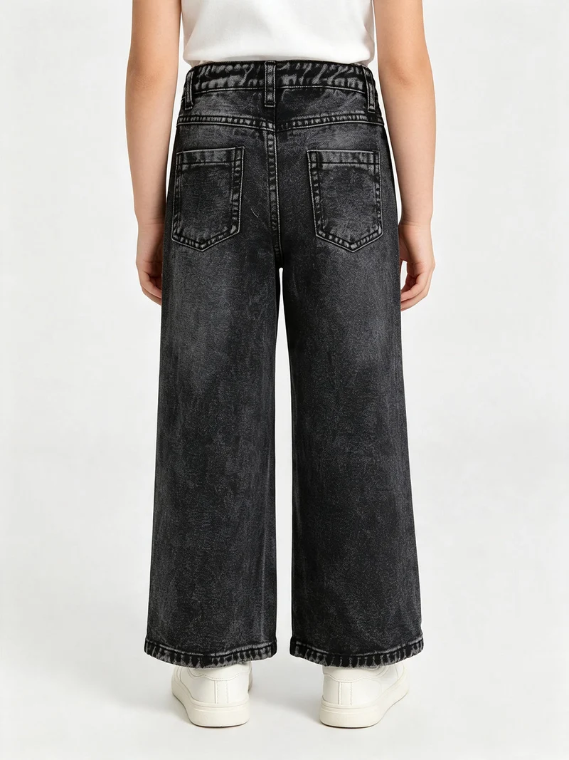 Jeans da bambina wide leg con dettagli di strass - nero