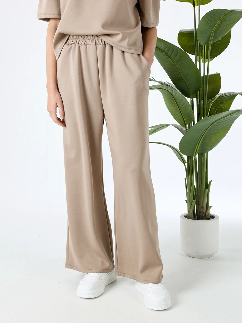 Pantaloni donna in felpa a gamba larga - marrone