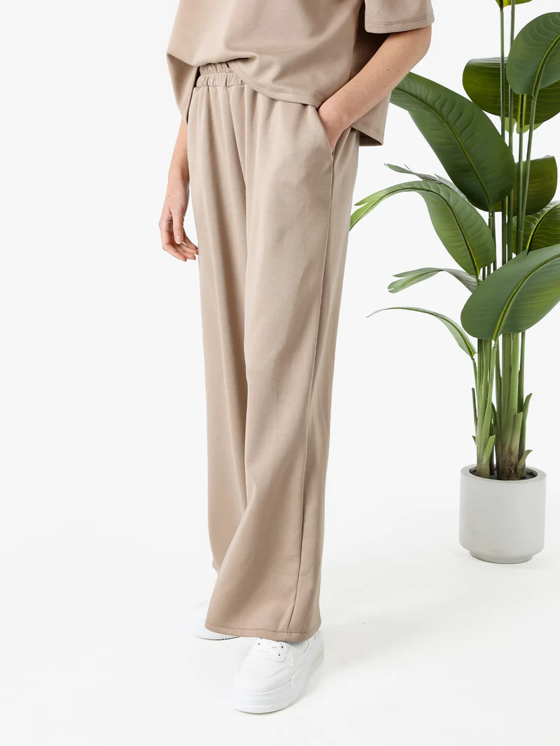 Pantaloni donna in felpa a gamba larga - marrone