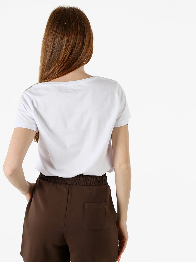 T-shirt donna in cotone con stampa animalier e micro borchie - bianco
