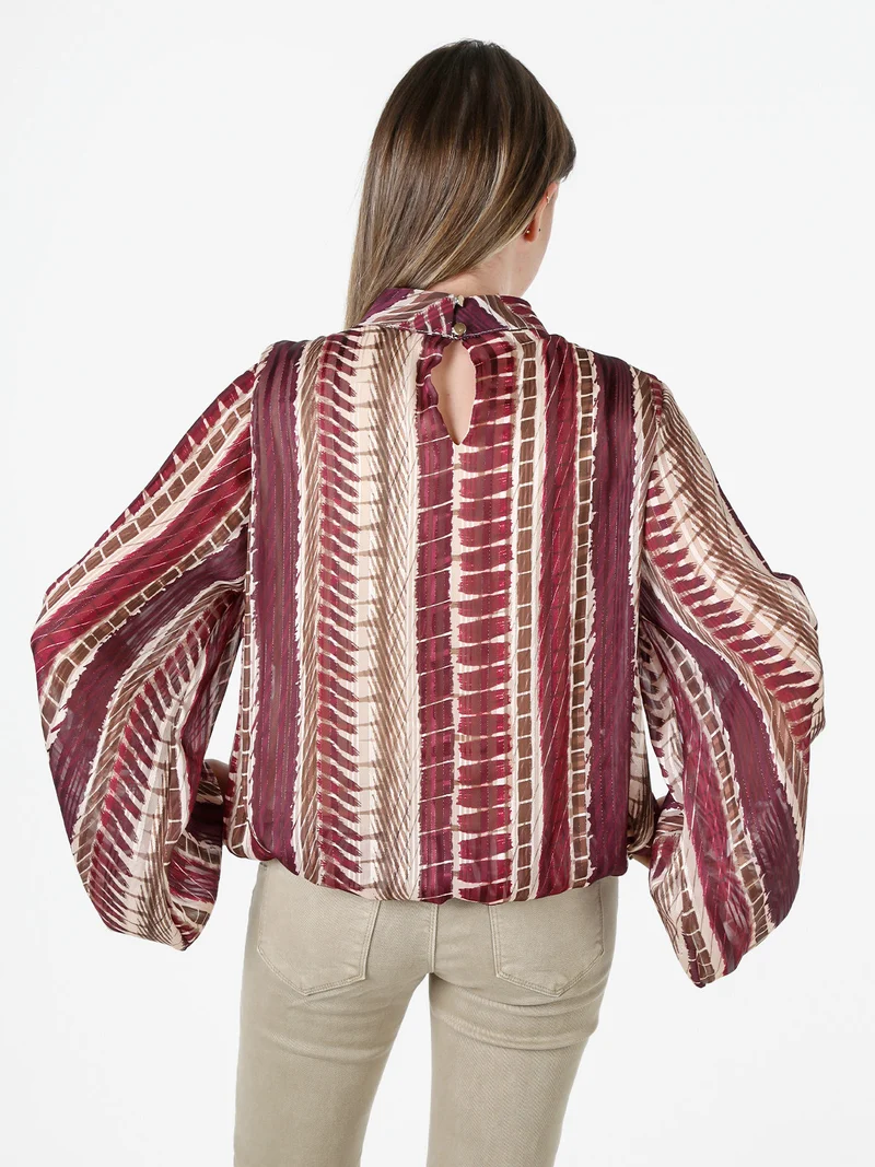 Blusa donna con stampe e maniche lunghe velate a palloncino - bordeaux