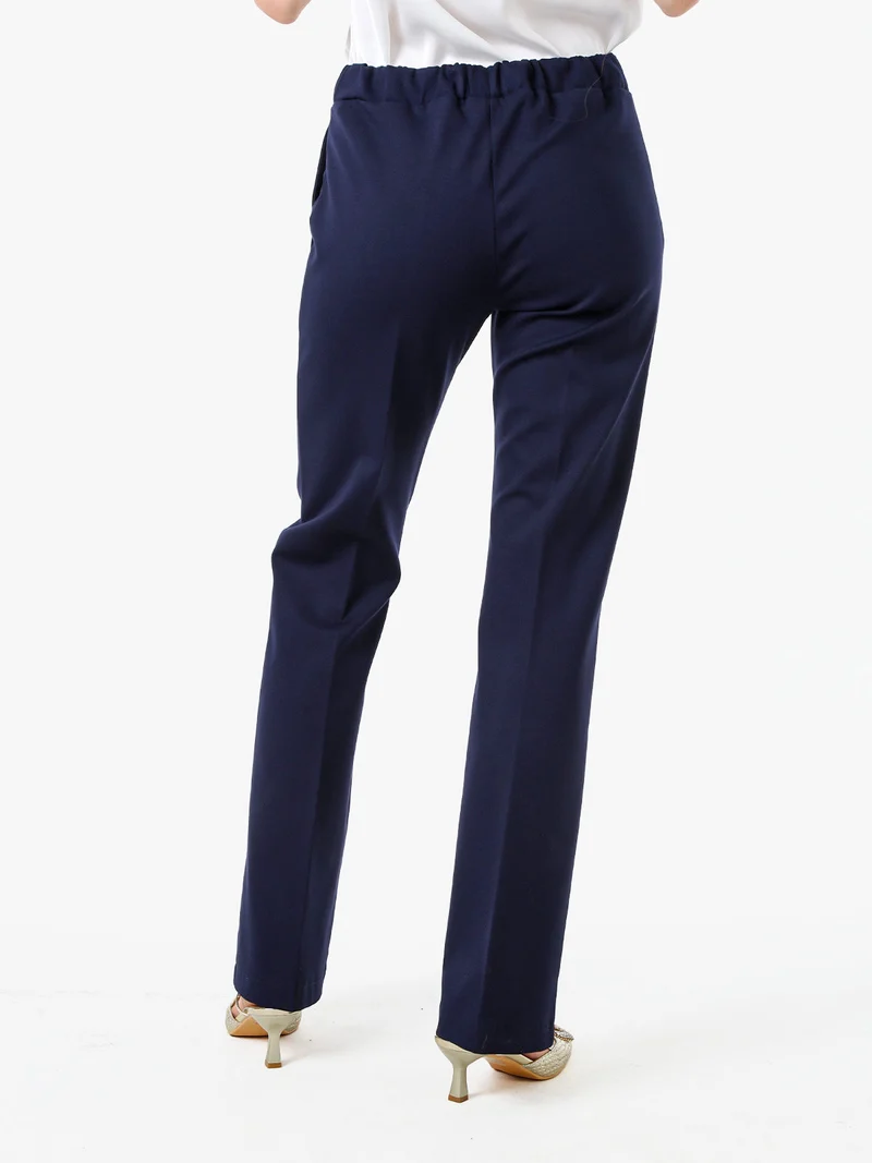 Completo elegante da donna con blazer e pantaloni con finale a zampa - blu