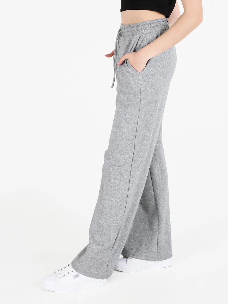 Pantaloni sportivi da donna a gamba larga con coulisse - grigio