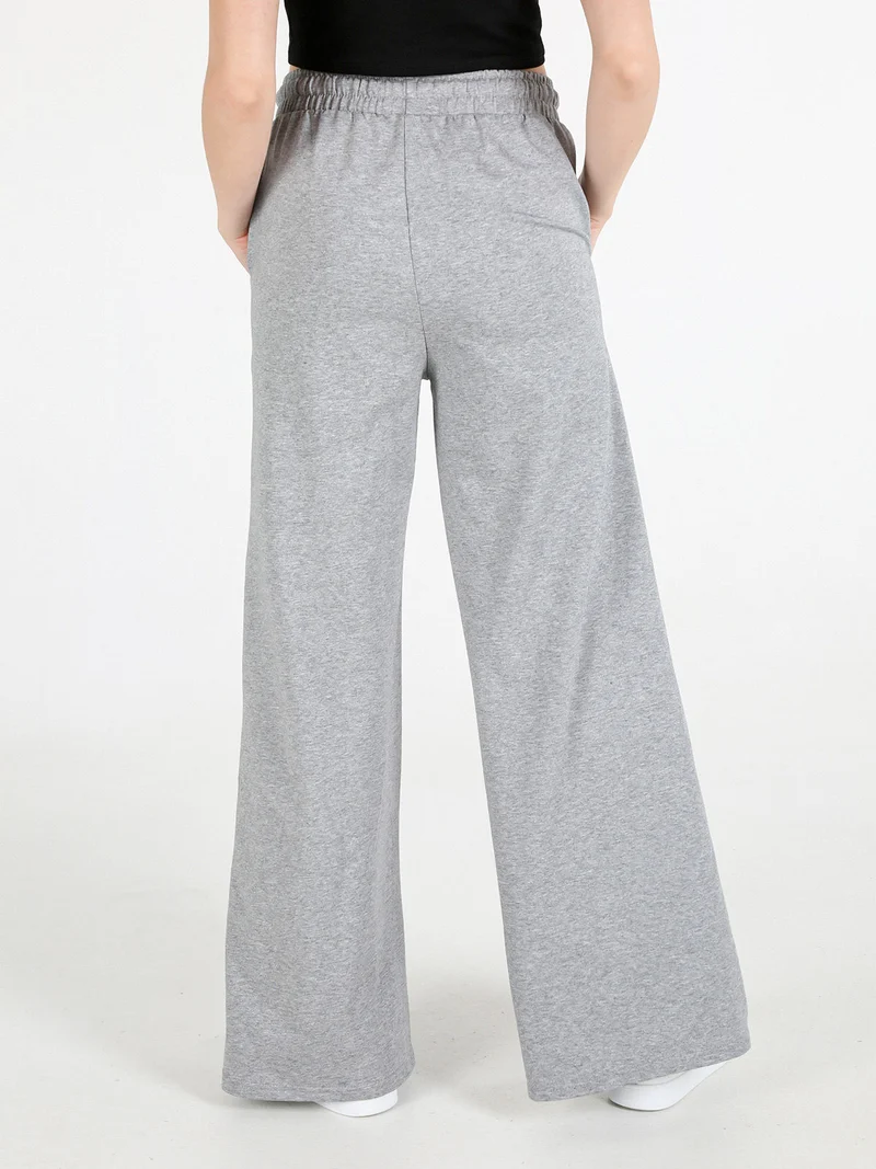 Pantaloni sportivi da donna a gamba larga con coulisse - grigio