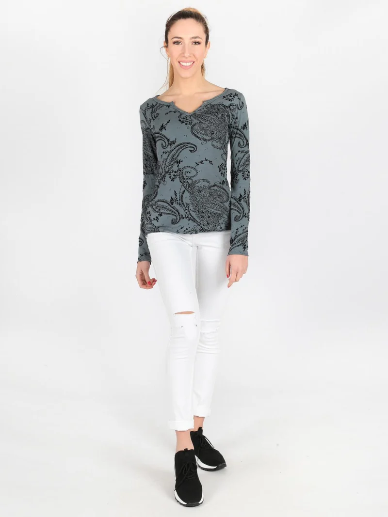 Jeans elasticizzati con strappi - bianco