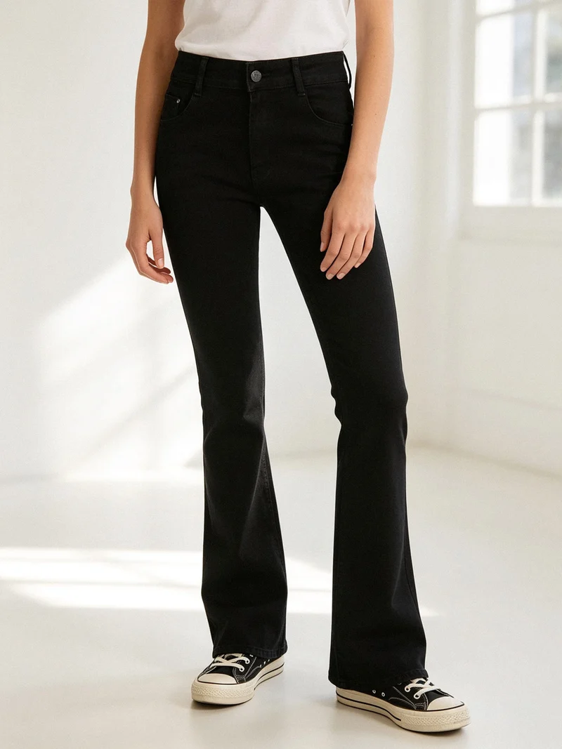 Pantaloni jeans donna push-up a zampa - nero