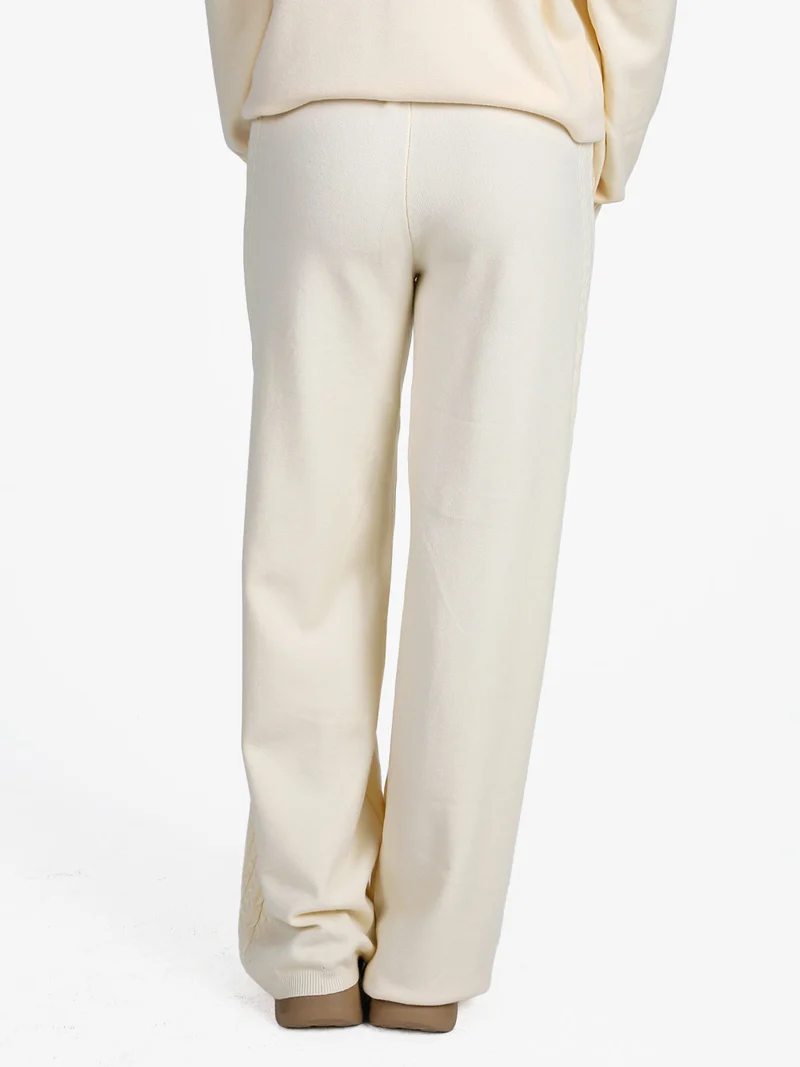 Pantaloni donna in maglia a trecce - panna