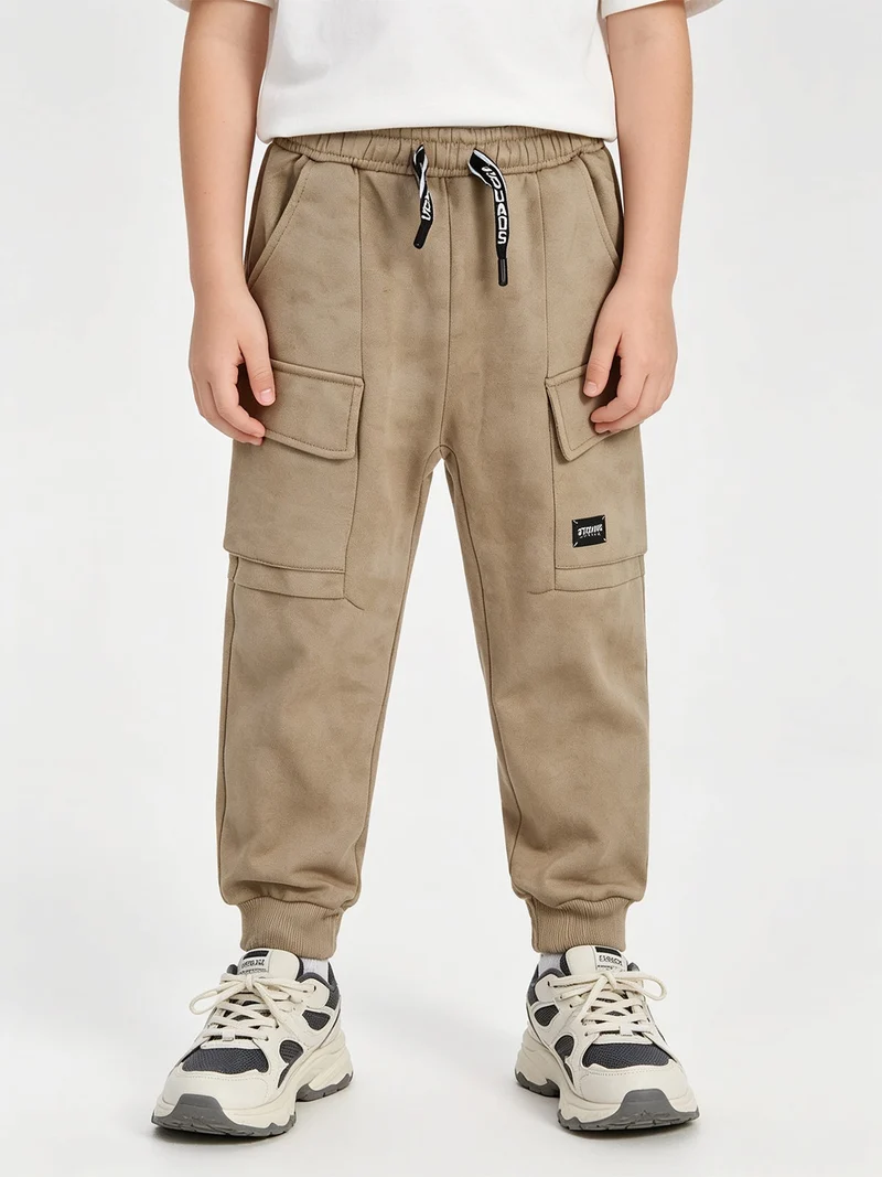 Pantaloni da ragazzo con tasconi e polsini - khaki
