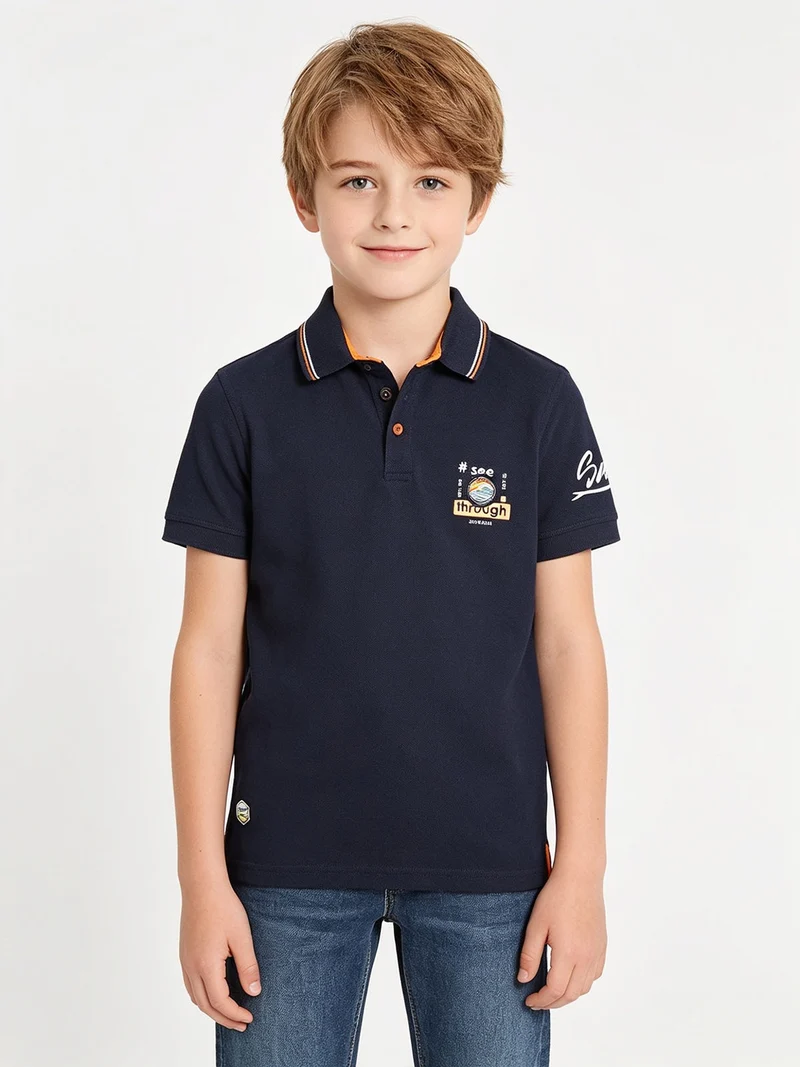 Polo da bambino a manica corta con scritta - blu scuro