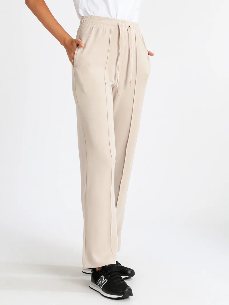 Pantaloni sportivi donna a zampa - nudo