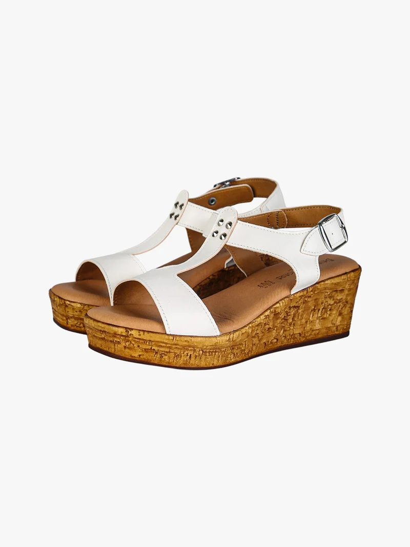 Sandali donna con zeppa e plateau e dettaglio borchie - bianco