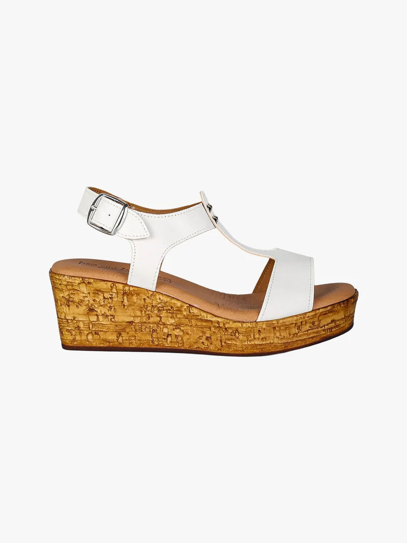 Sandali donna con zeppa e plateau e dettaglio borchie - bianco
