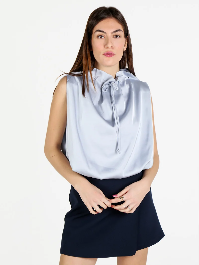 Top donna smanicato a palloncino - azzurro