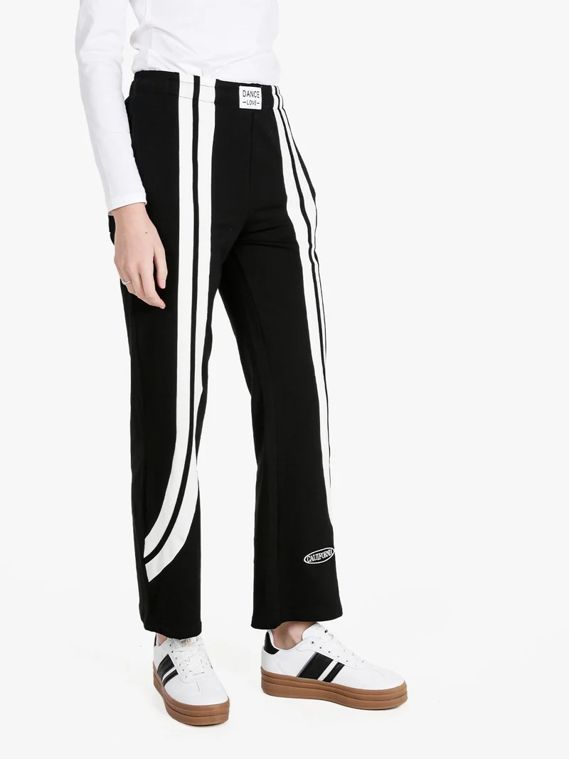 Pantaloni sportivi in felpa da donna - nero