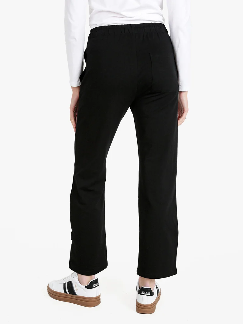 Pantaloni sportivi in felpa da donna - nero