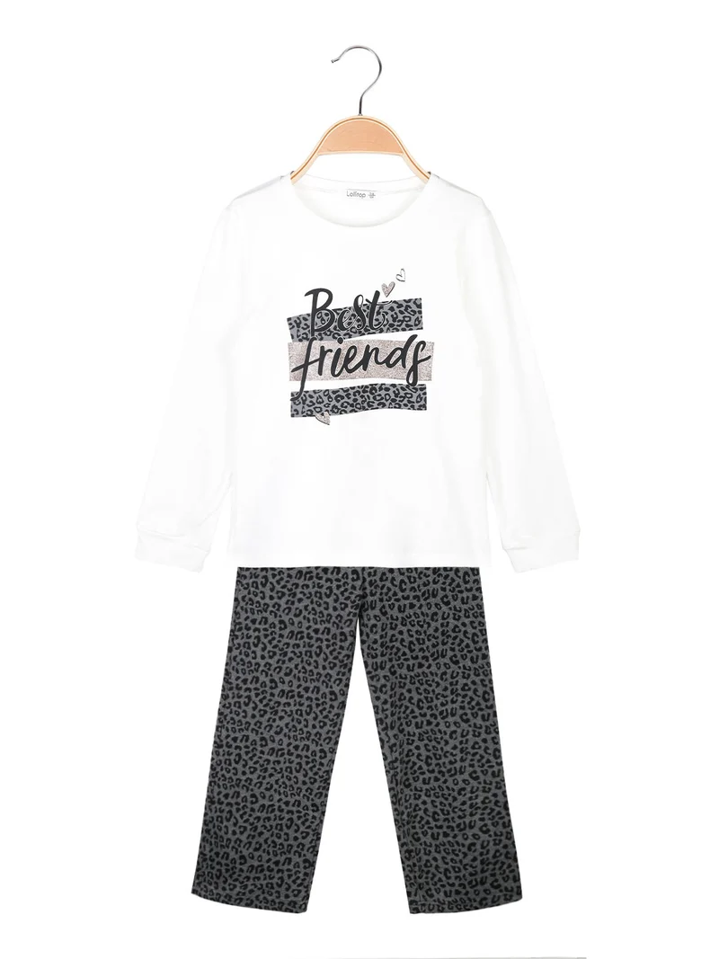 Completo da bambina 2 pezzi con pantaloni maculati gamba larga - bianco
