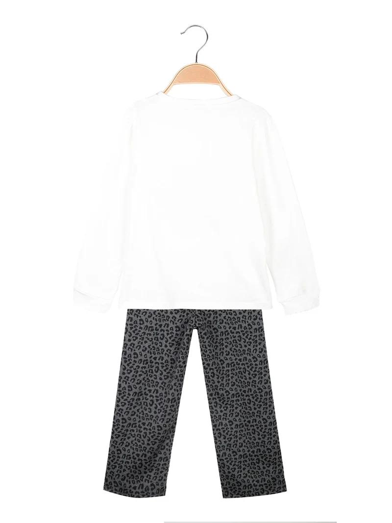 Completo da bambina 2 pezzi con pantaloni maculati gamba larga - bianco