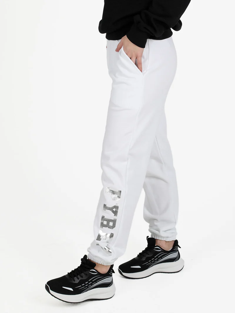 Pantaloni donna sportivi in felpa - bianco