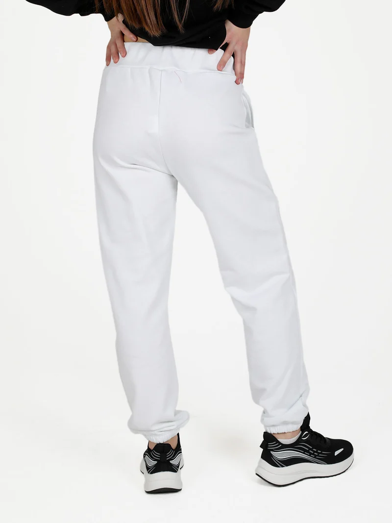 Pantaloni donna sportivi in felpa - bianco
