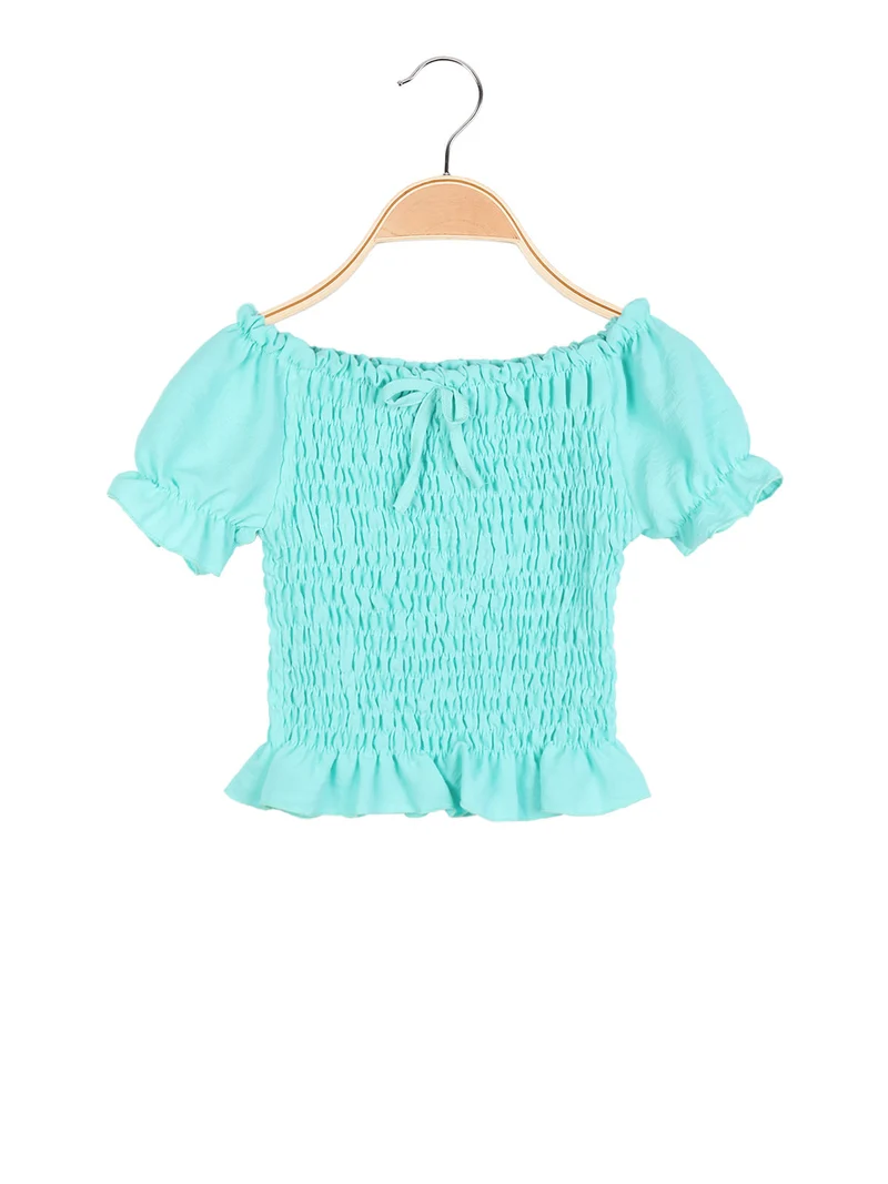 Top corto da bambina elasticizzato - acqua marina