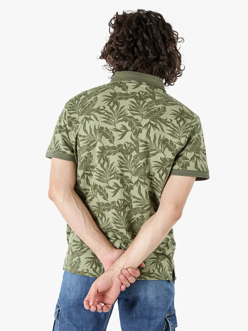 Polo da uomo in cotone a maniche corte con stampa floreale - verde