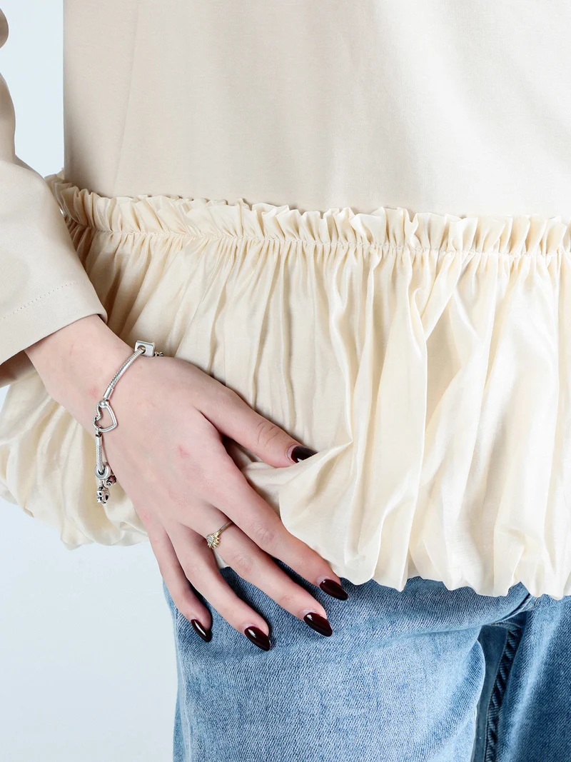 Maglia donna oversize con bordo finale a palloncino - beige