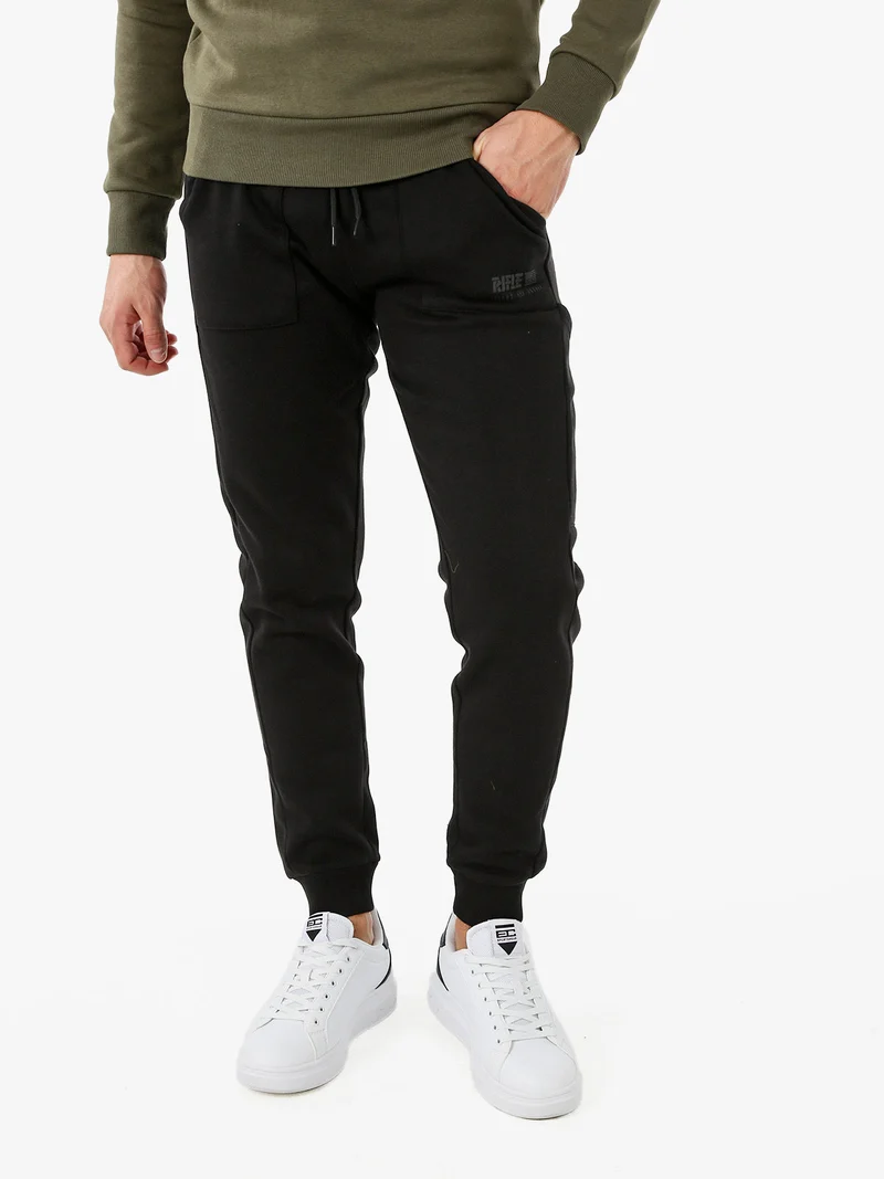 Pantaloni tuta da uomo con polsini - nero
