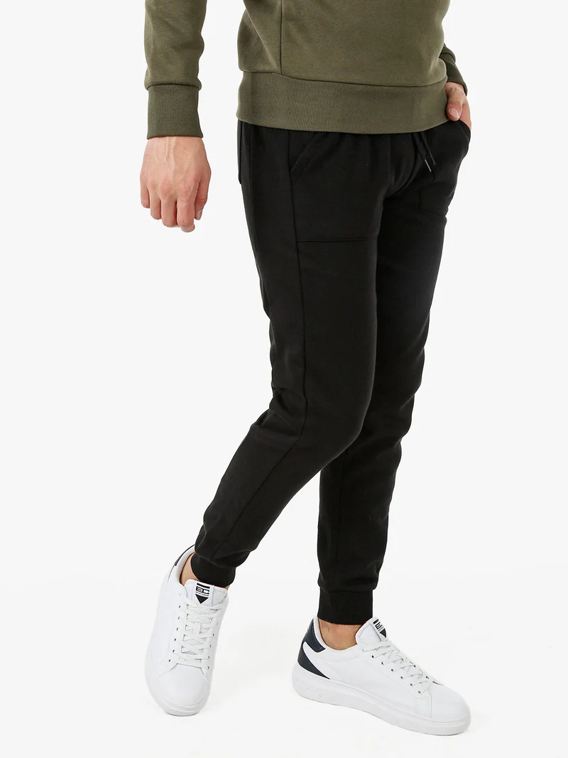 Pantaloni tuta da uomo con polsini - nero