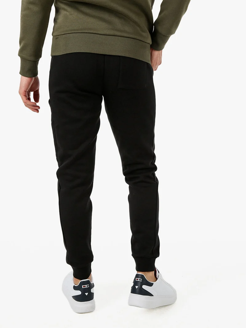 Pantaloni tuta da uomo con polsini - nero