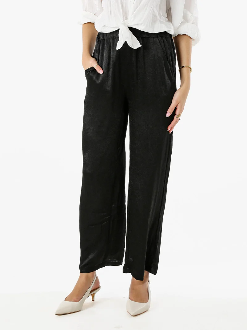 Pantaloni donna leggeri effetto lucido - nero