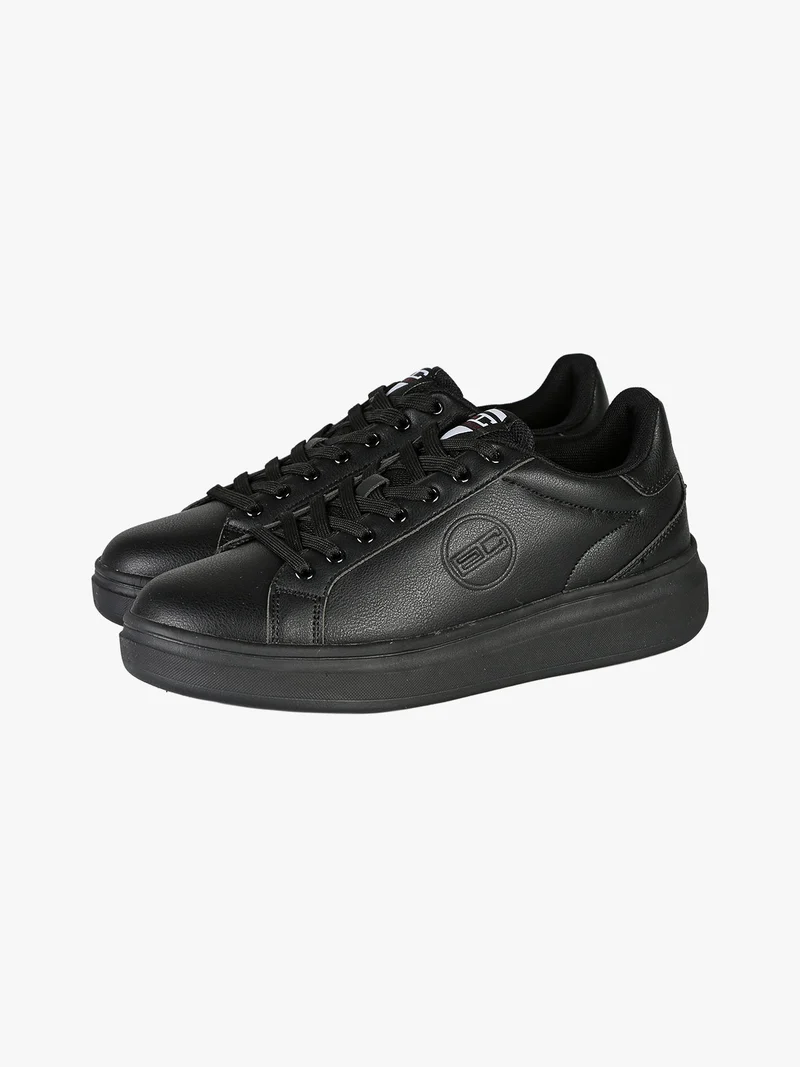 Sneakers stringate da uomo con suola alta - nero