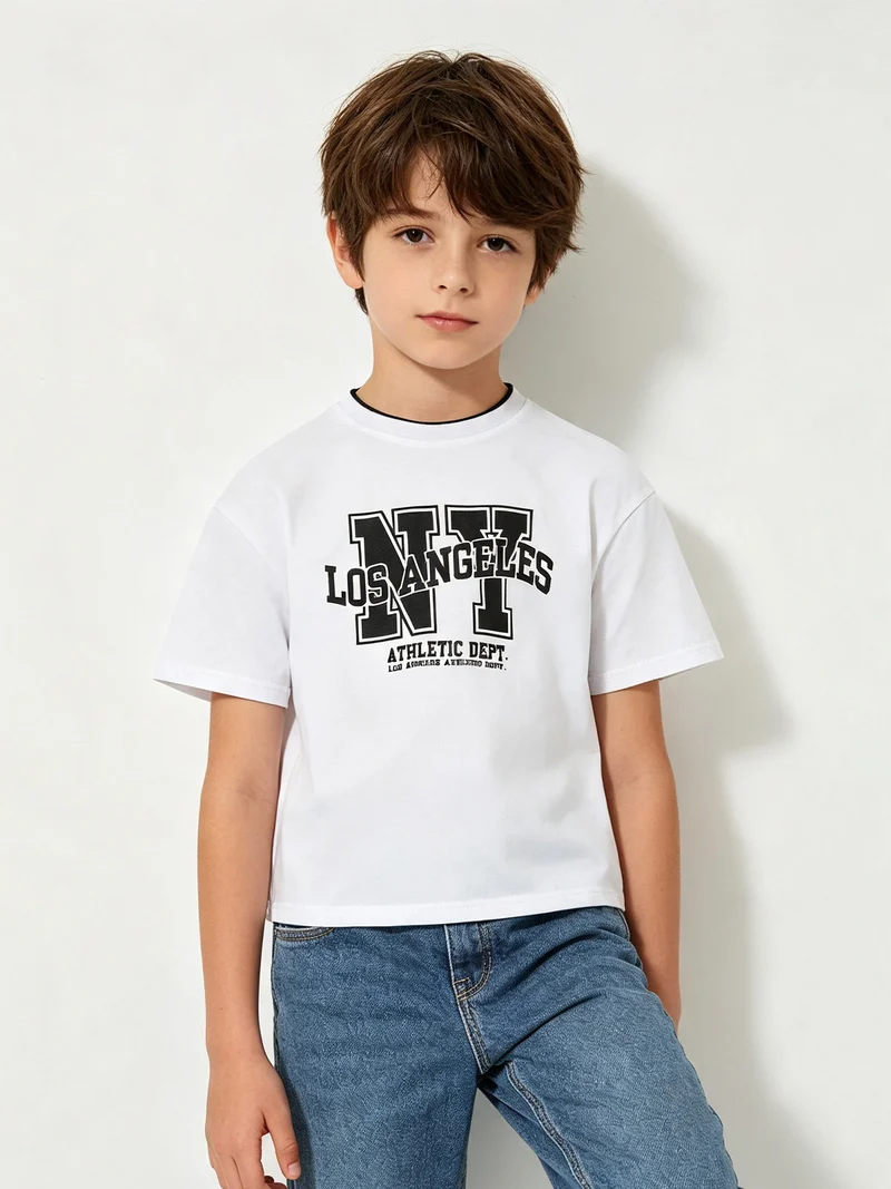 T-shirt da bambino in cotone con stampa scritta - bianco