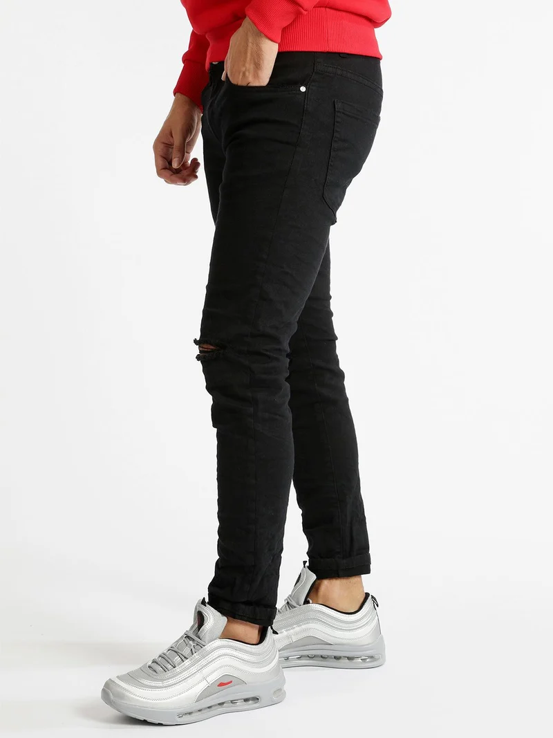 Pantaloni bianchi strappati - nero
