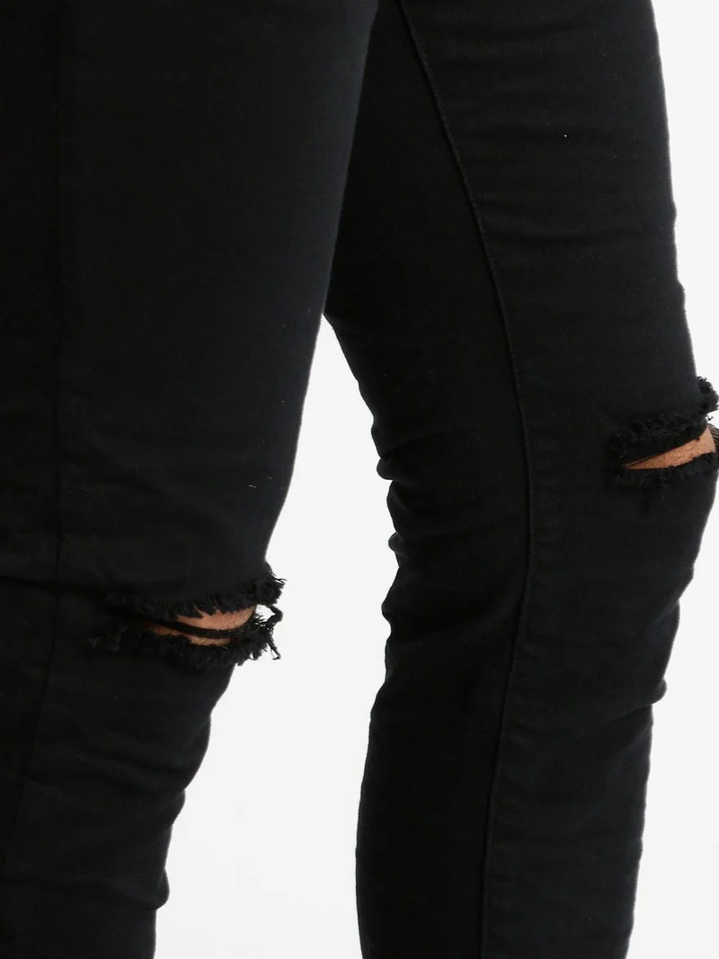Pantaloni bianchi strappati - nero