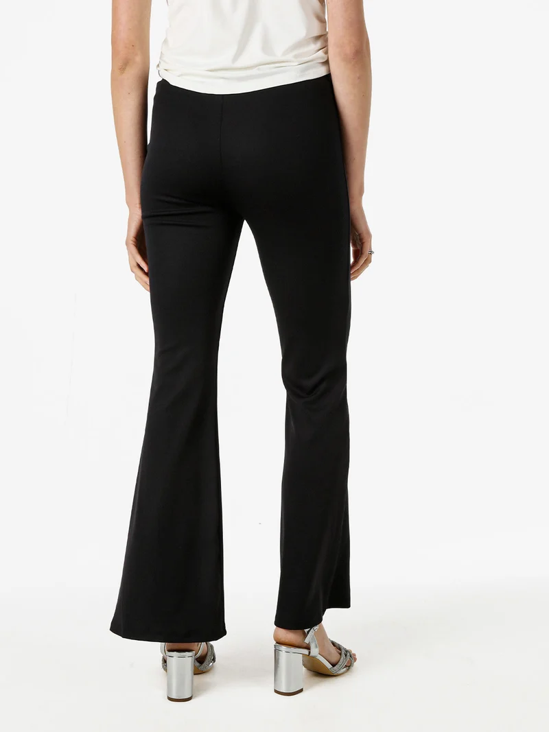 Pantaloni eleganti da donna con finale a zampa - nero