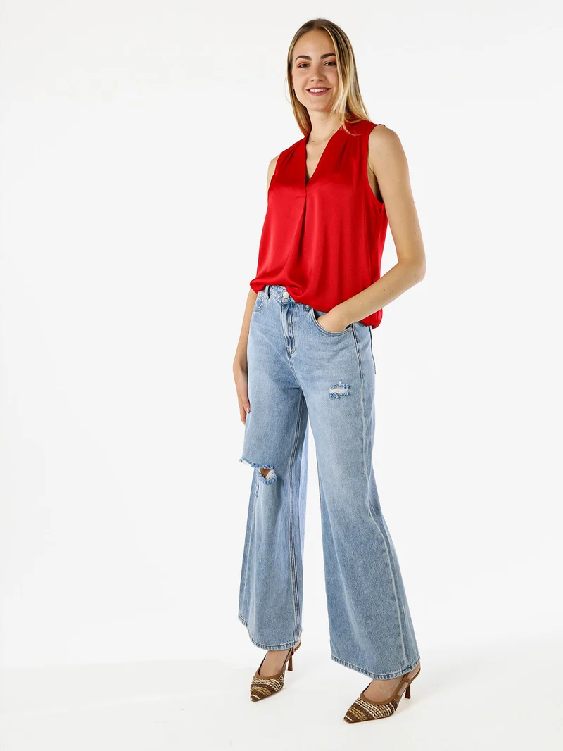 Top donna smanicato con scollo a V profondo - rosso