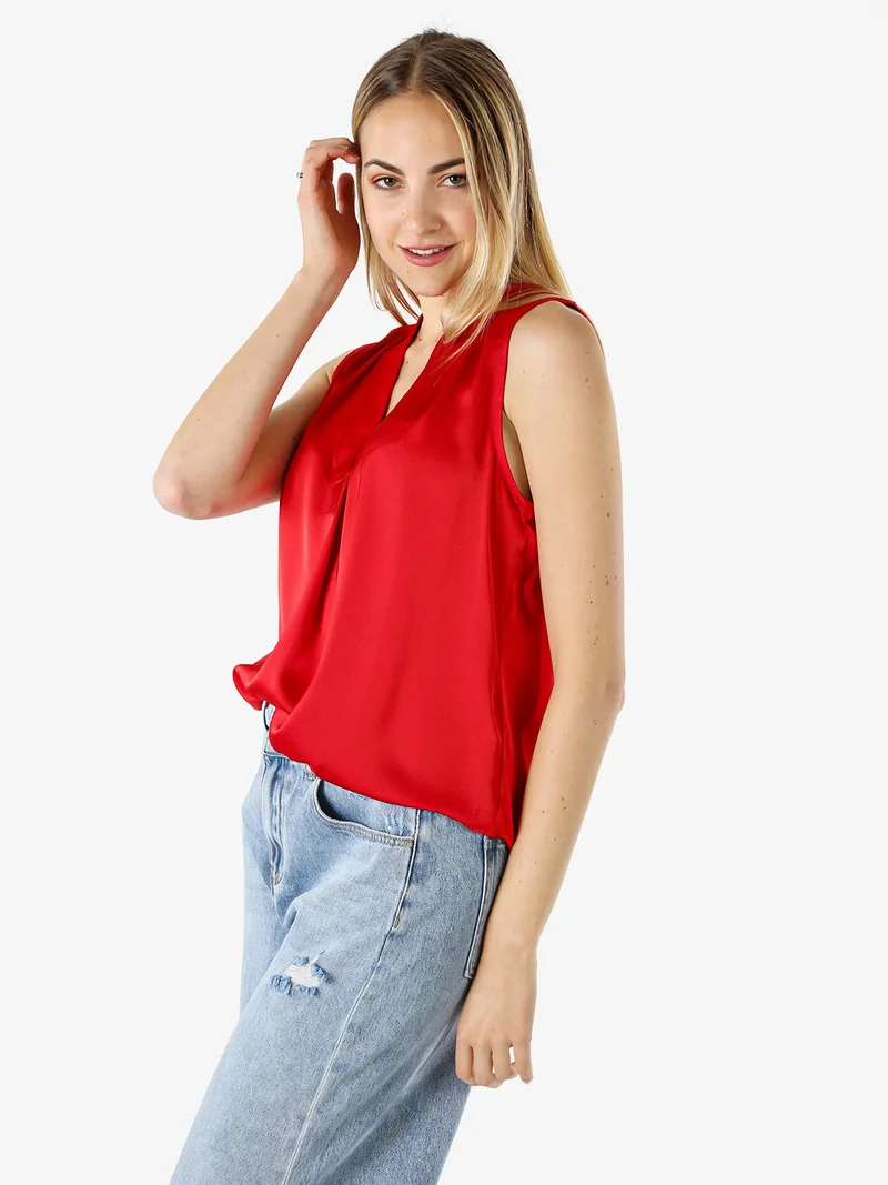 Top donna smanicato con scollo a V profondo - rosso
