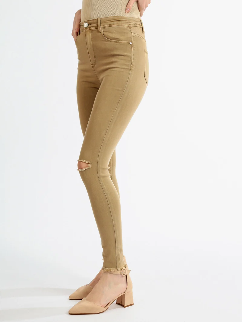 Pantaloni donna elasticizzati con strappi - cammello